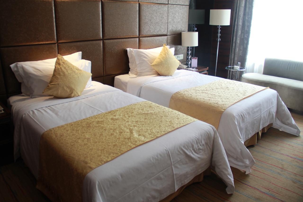 Huangjingang Holiday Hotel Jiexiu Zimmer foto